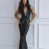 Black sequin maxi dress with deep V-neckline and fitted silhouette worn by model — Chic Le Frique | Endless UAE