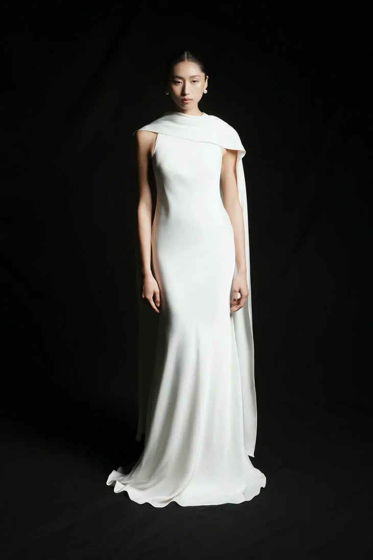 Venus Silk Dress in ivory with dramatic cape detailing, flowing silhouette — Huong Boutique | Endless UAE