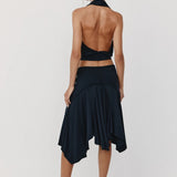 Black halter crop top and asymmetrical handkerchief skirt set, back view showing open back design — With Jean | Endless UAE