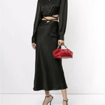 Black silk wrap-around tie cropped shirt with long sleeves and collar — Christopher Esber | Endless UAE
