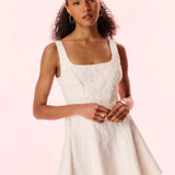 White textured mini dress with square neckline and flared skirt — LoveShackFancy | Endless UAE