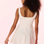 White textured mini dress with square neckline and flared skirt — LoveShackFancy | Endless UAE