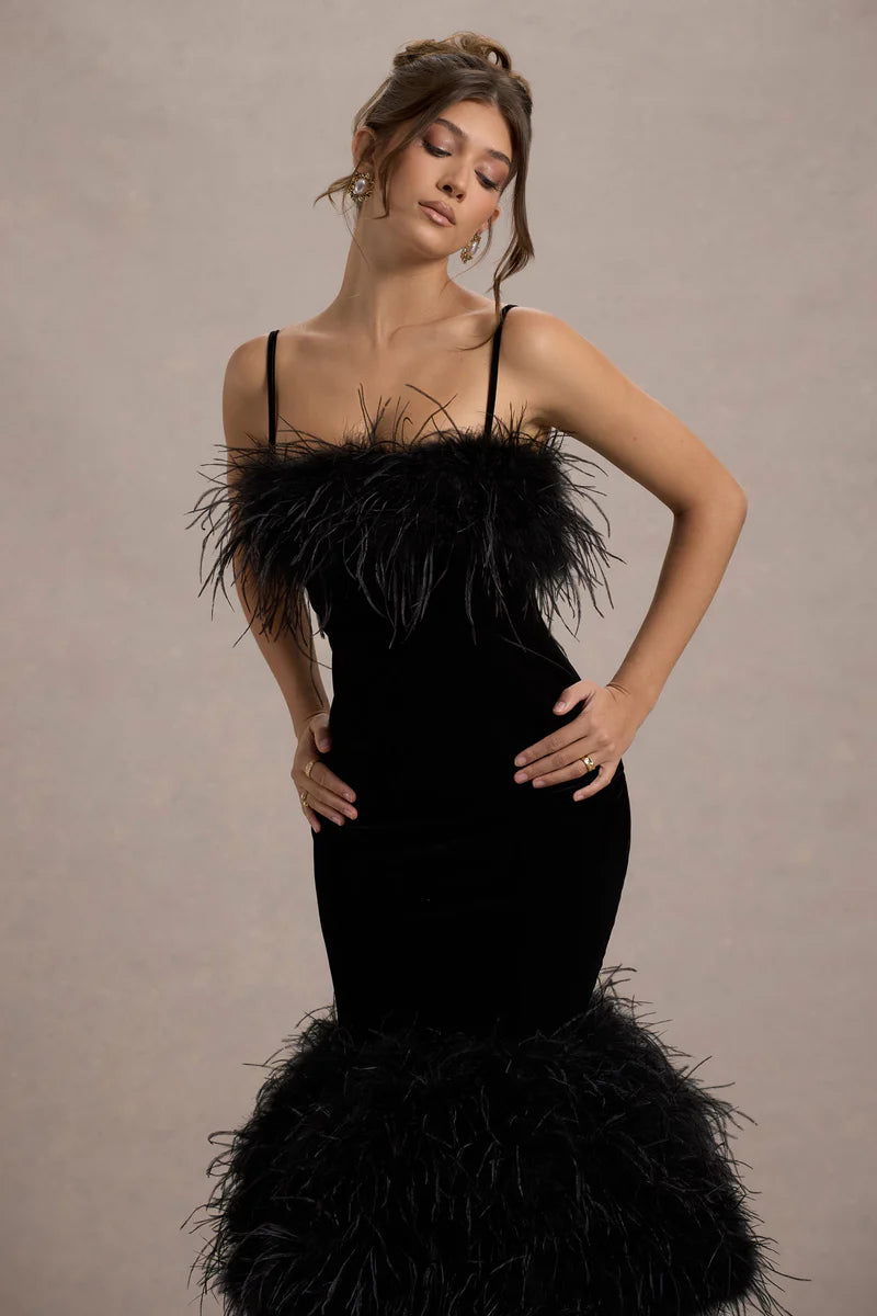 Woman wearing black velvet midi dress with feather trim and spaghetti straps — Club L London | Endless UAE