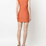 Coperni orange cap sleeve jersey mini dress with cut out detail, worn with black kitten heel sandals, back view — Coperni | Endless UAE