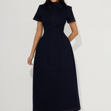 Woman wearing navy cotton denim collared midi dress with short sleeves — Endless | Endless UAE