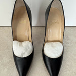 Black pointed-toe pumps with beige leather insole and white tissue paper insert — Endless | Endless UAE