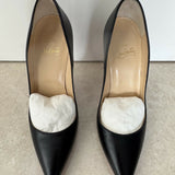 Black pointed-toe pumps with beige leather insole and white tissue paper insert — Endless | Endless UAE