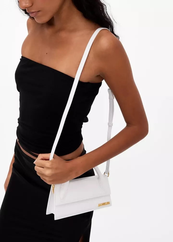 White leather shoulder bag with gold Jacquemus logo — Jacquemus | Endless UAE