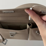 Beige patent leather shoulder bag with dual compartments and silver turnlock closures — Endless | Endless UAE