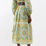 Paisley printed midi dress with cut-out back, balloon sleeves, and tie-front detail in turquoise and yellow — Zimmermann | Endless UAE