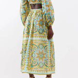 Paisley printed midi dress with cut-out back, balloon sleeves, and tie-front detail in turquoise and yellow — Zimmermann | Endless UAE