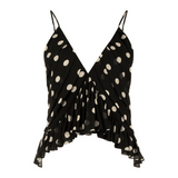 Black polka dot pleated camisole top with thin straps and flowing ruffled hem — Khaite | Endless UAE