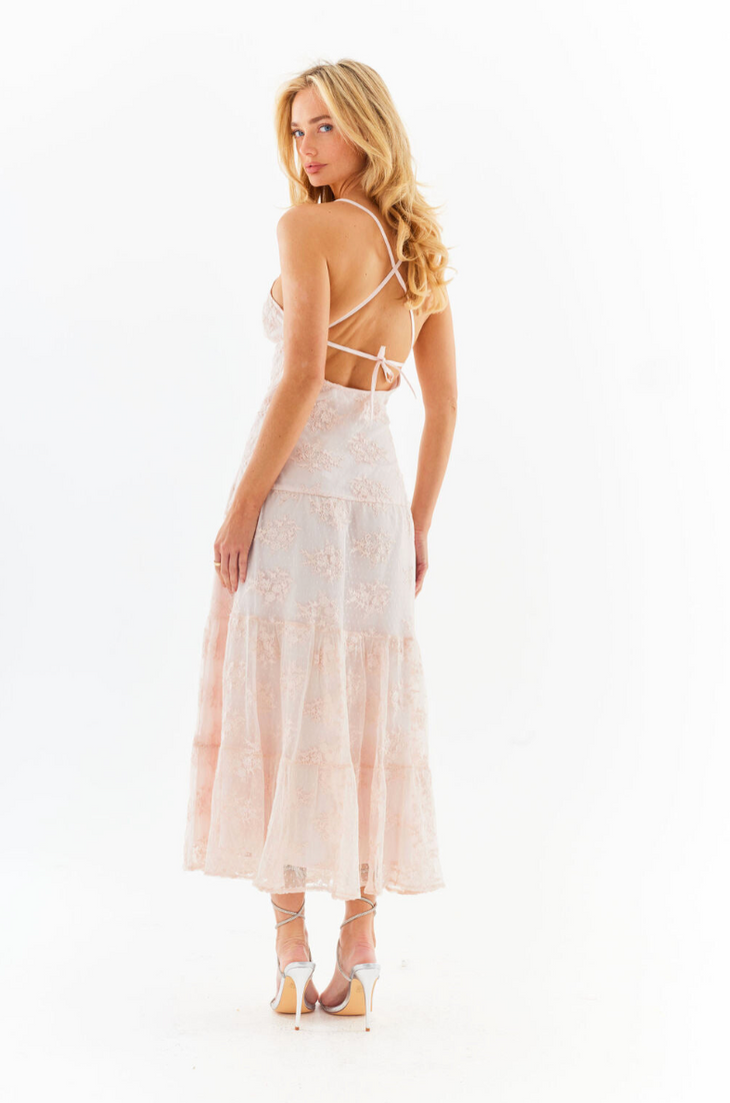 Blonde woman in blush pink floral lace maxi dress with strappy back detail and tiered skirt — Amy Jane London | Endless UAE