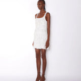 White fringed mini dress with square neckline and sleeveless design — ILTA | Endless UAE