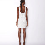 White fringed mini dress with square neckline and sleeveless design — ILTA | Endless UAE
