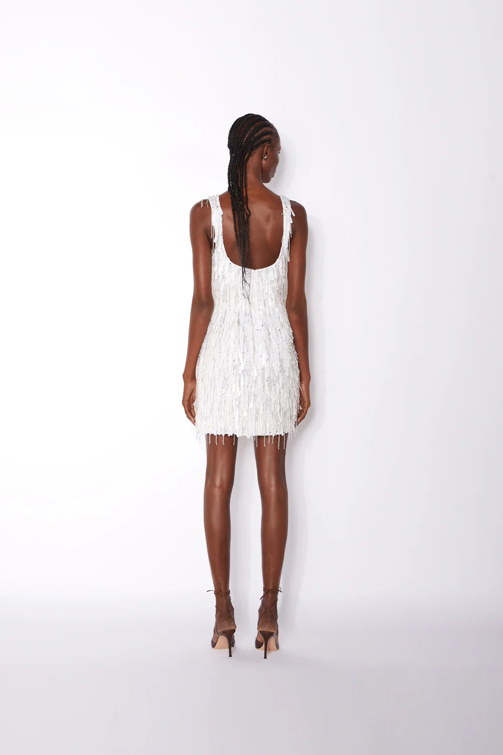 White fringed mini dress with square neckline and sleeveless design — ILTA | Endless UAE