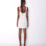 White fringed mini dress with square neckline and sleeveless design — ILTA | Endless UAE