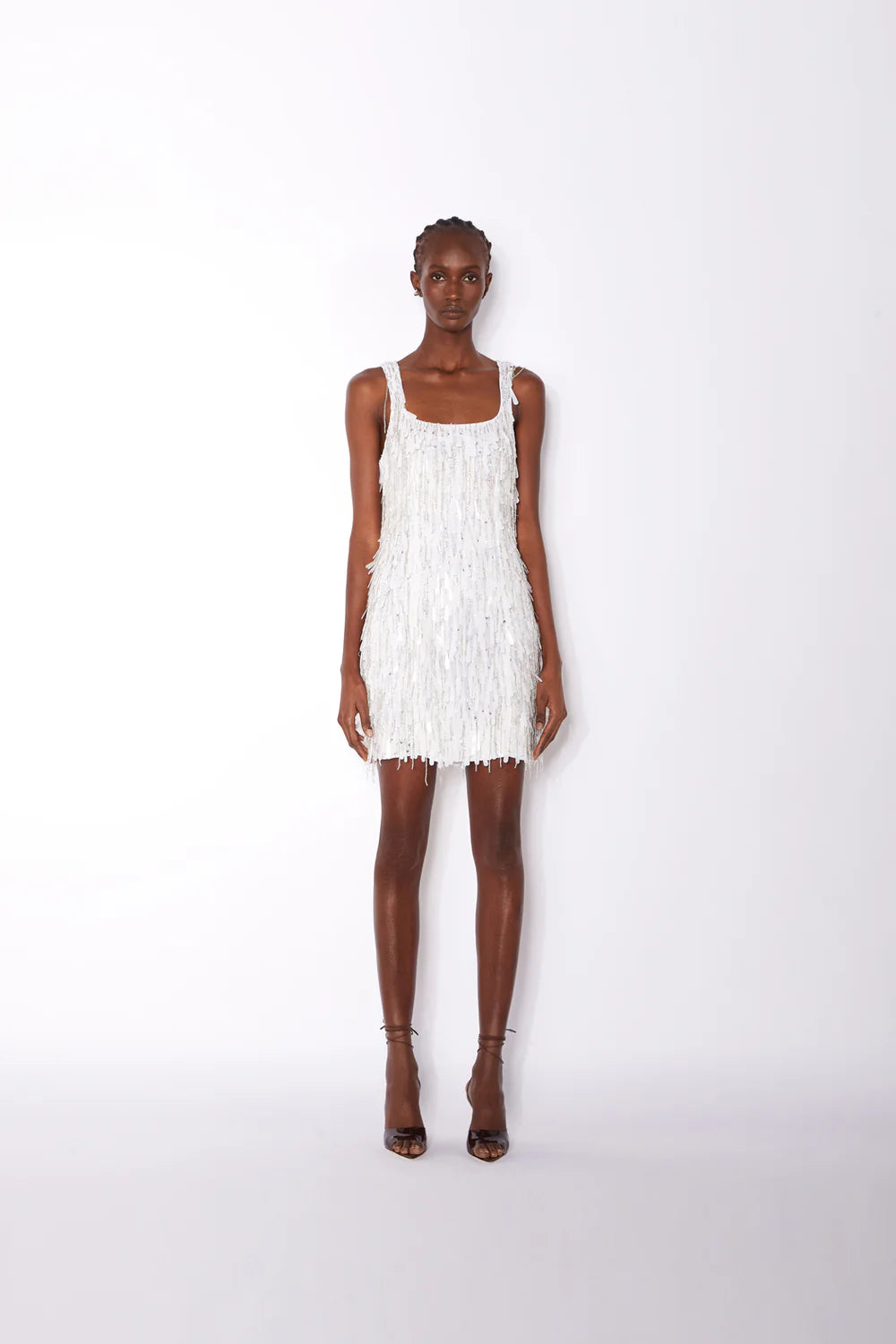 White fringed mini dress with square neckline and sleeveless design — ILTA | Endless UAE