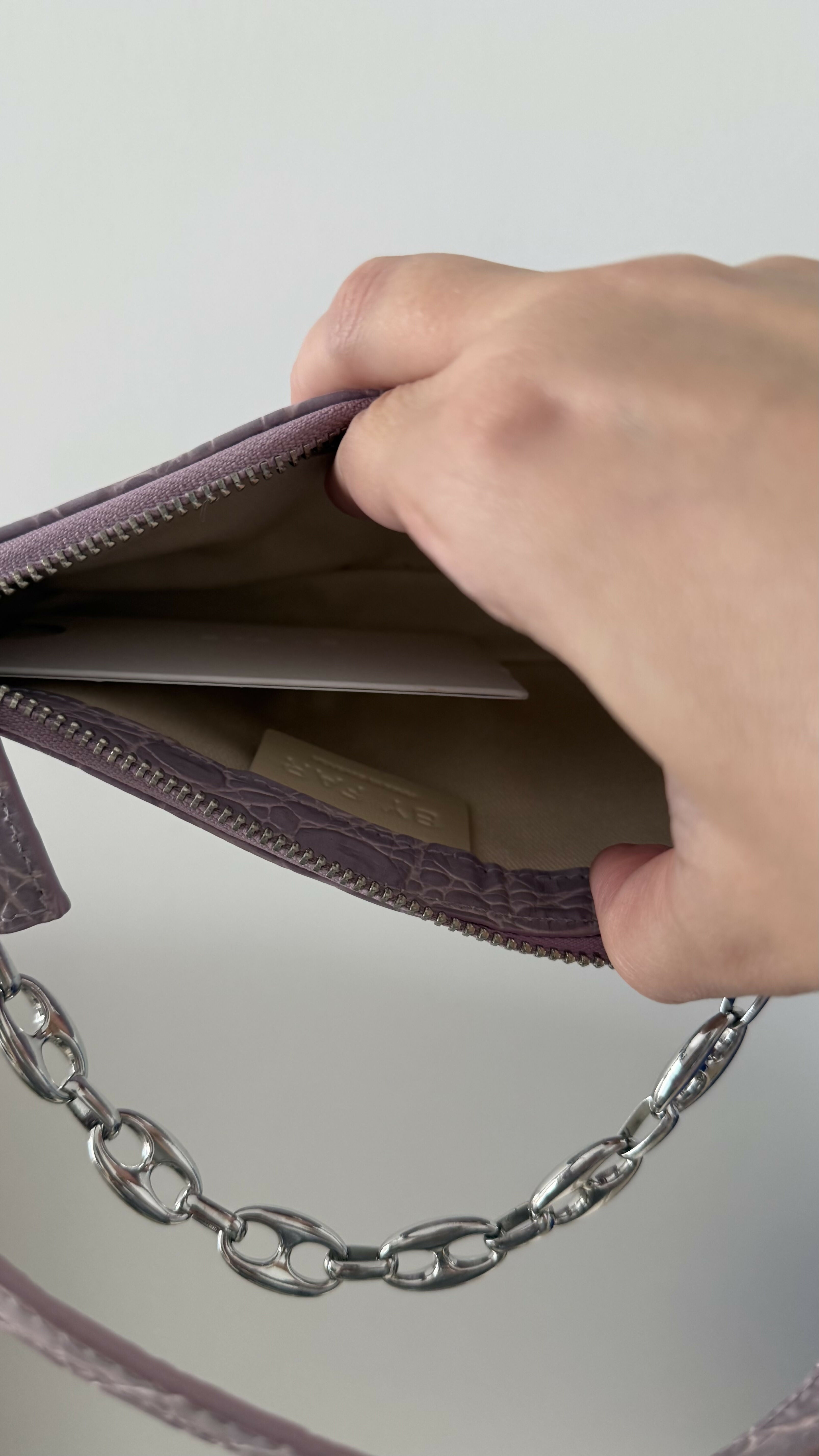 Mini Rachel Lilac Croco Embossed Leather Bag held in hand against white background — By Far | Endless UAE