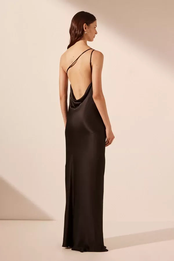 Black satin one shoulder maxi dress with dramatic cowl back detail worn by brunette model — Shona Joy | Endless UAE