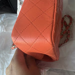 Coral quilted lambskin mini classic handbag with gold CC logo — Chanel | Endless UAE
