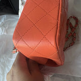 Coral quilted lambskin mini classic handbag with gold CC logo — Chanel | Endless UAE
