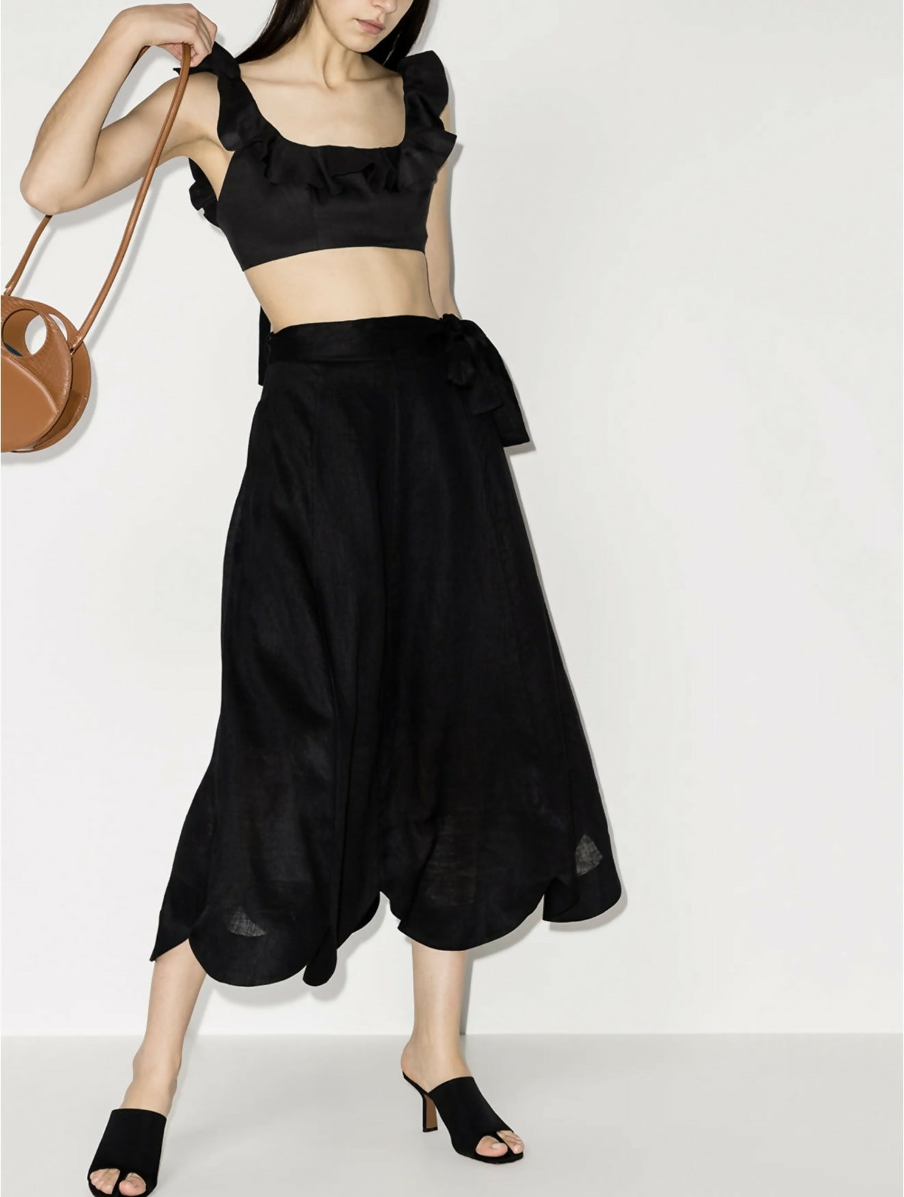 Black linen cropped top with ruffle neck detail and tie straps, paired with matching midi skirt — Zimmermann | Endless UAE