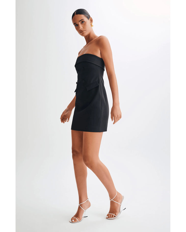 Black strapless mini dress with tailored suiting details and fold-over bodice, styled with strappy white heels — Meshki | Endless UAE