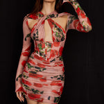 Rose print mesh bodycon mini dress with corset detail and long sleeves on model — House of CB | Endless UAE