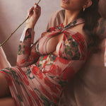 Elegant rose print corset mini dress with pleated skirt and long sleeves in pink and red tones — House of CB | Endless UAE