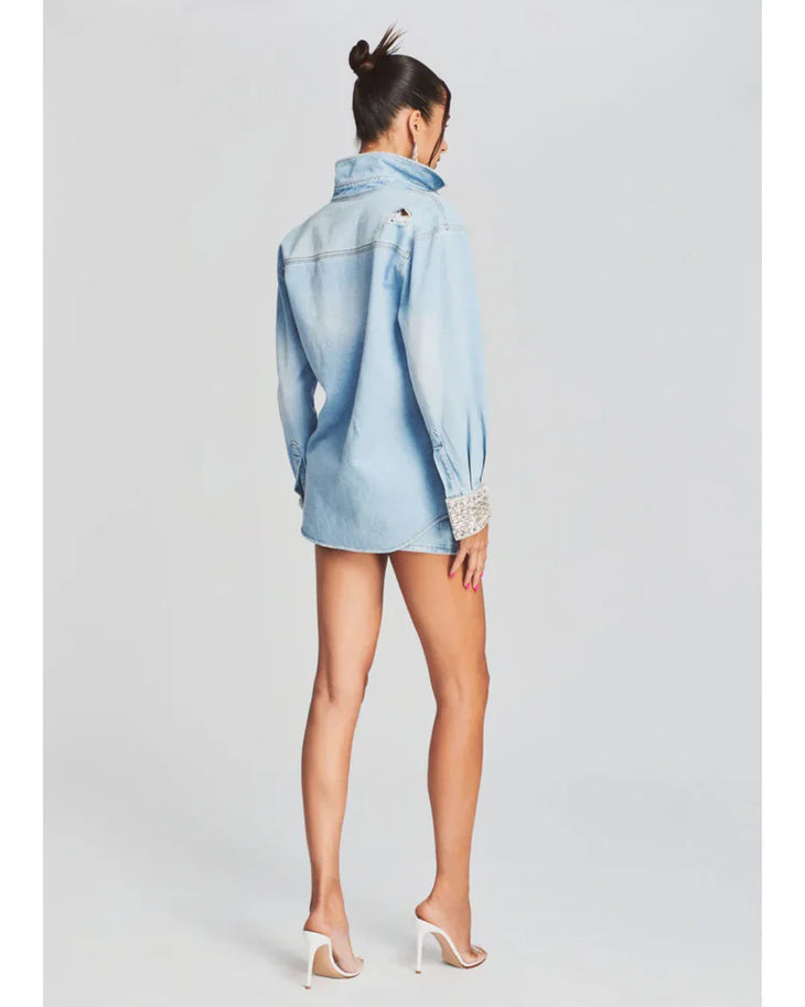 Light blue denim shirt dress with crystal-embellished cuffs and distressed details — Retrofete | Endless UAE