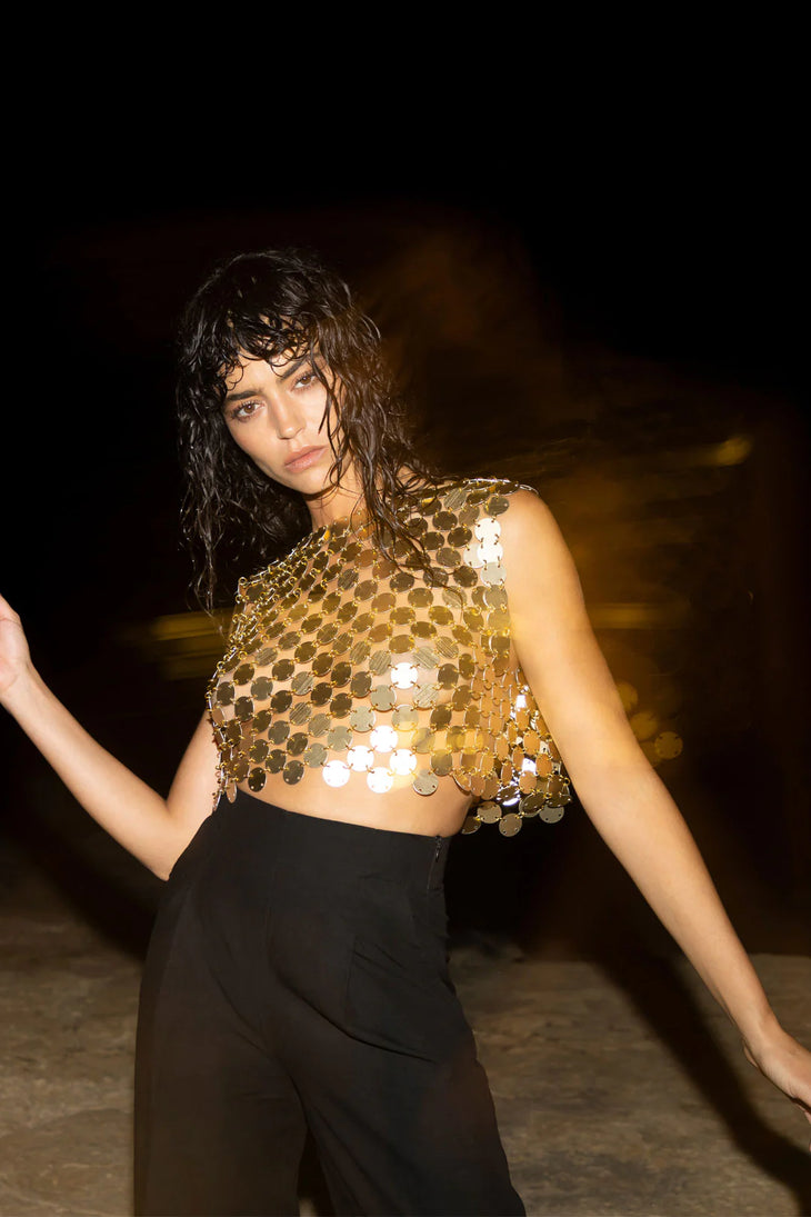 Gold sequin chainmail crop top with black high-waisted trousers — Isabel Moore | Endless UAE