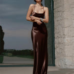 Alyssa Dress in chocolate brown satin with thin straps and floor-length silhouette — Dvete | Endless UAE