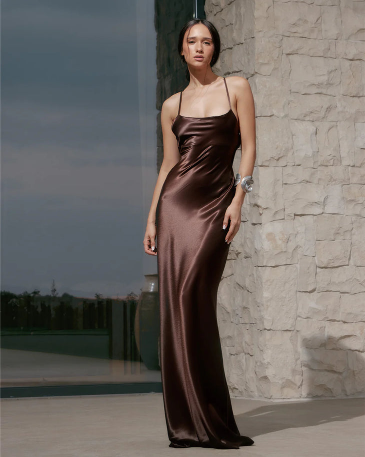 Brown satin slip dress with thin straps and flowing maxi silhouette — Dvete | Endless UAE