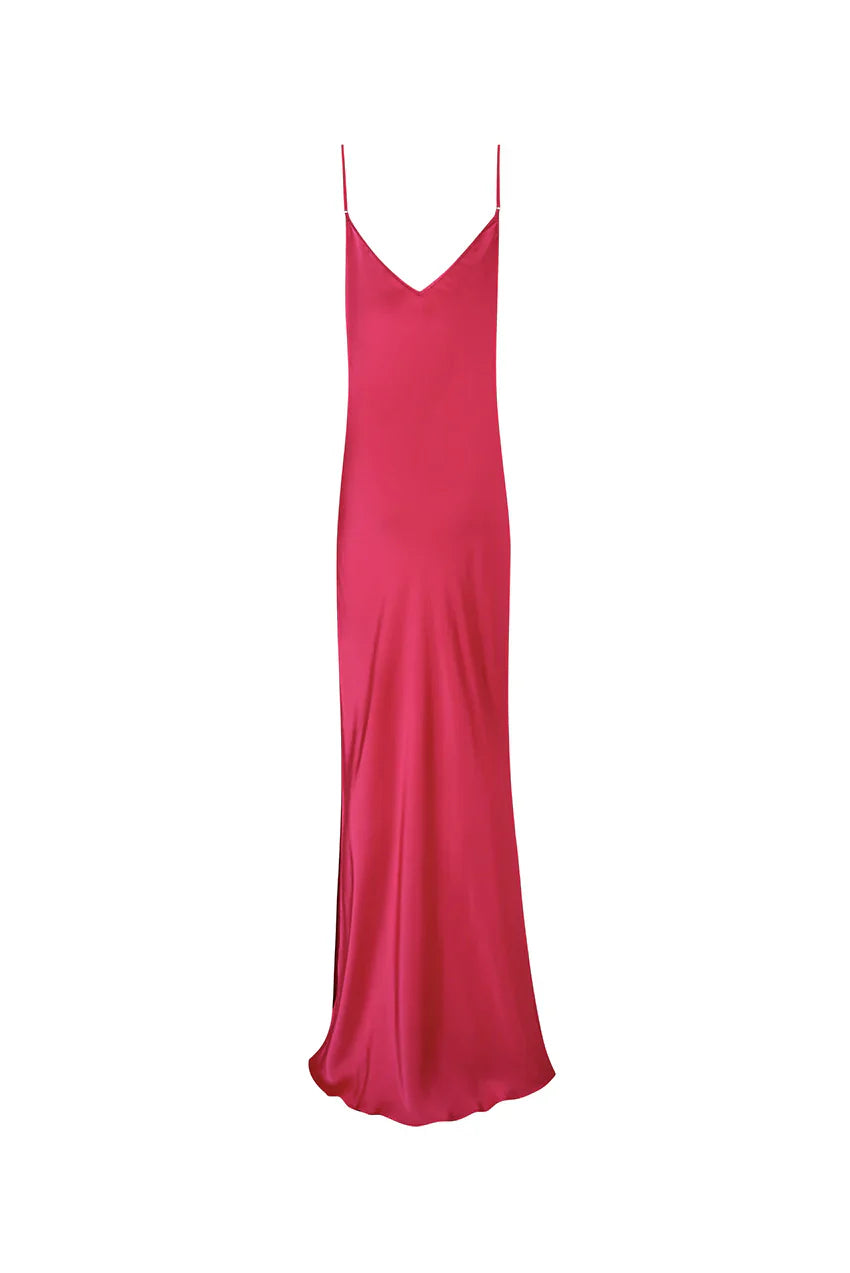 Woman wearing hot pink satin slip dress in tropical setting — Rat & Boa | Endless UAE