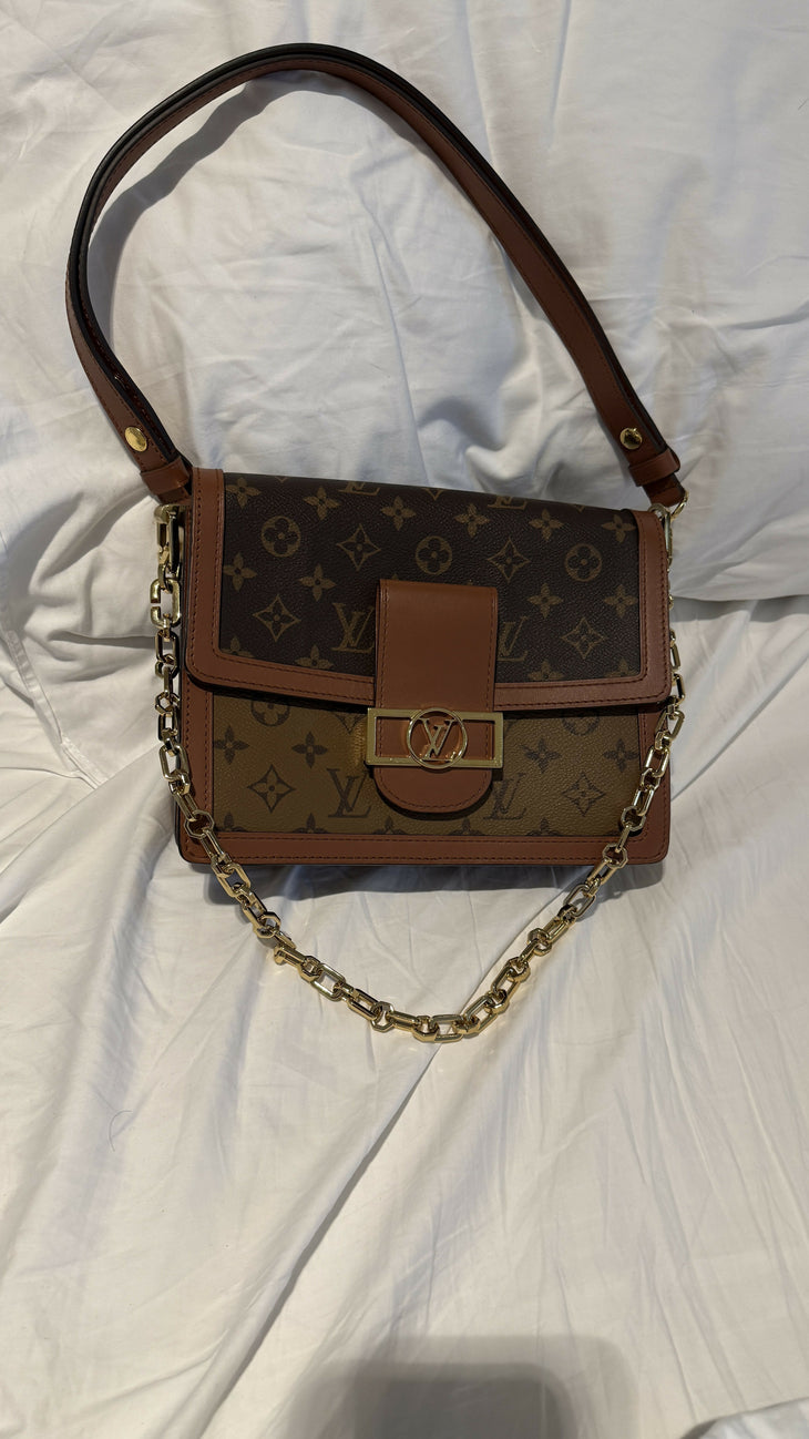 Louis Vuitton Dauphine MM shoulder bag in monogram canvas with brown leather trim and chain strap — Louis Vuitton | Endless UAE