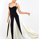 Black fitted jumpsuit with dramatic flowing white side panels and sweetheart neckline — Arcina Ori | Endless UAE