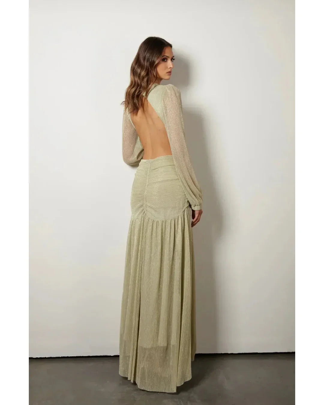 Woman wearing The Goddess Green Dress by Anne Louise Boutique — Endless UAE