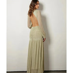 Woman wearing The Goddess Green Dress by Anne Louise Boutique — Endless UAE
