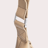 Baby Amber semi patent mini leather handbag in beige with quilted detail and adjustable strap — By Far | Endless UAE