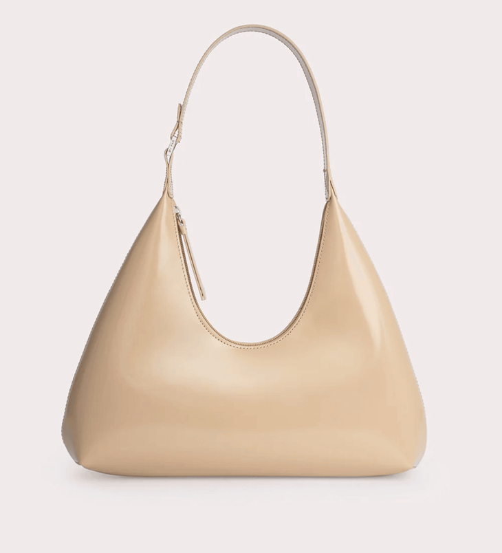 Baby Amber semi-patent leather mini hobo bag in beige with single shoulder strap and zip closure — By Far | Endless UAE