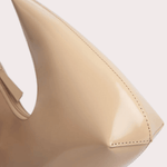 Baby Amber semi patent mini leather handbag in beige with pointed toe detail and top handle — By Far | Endless UAE