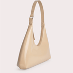 Baby Amber semi-patent mini leather hobo bag in beige with adjustable shoulder strap and buckle detail — By Far | Endless UAE