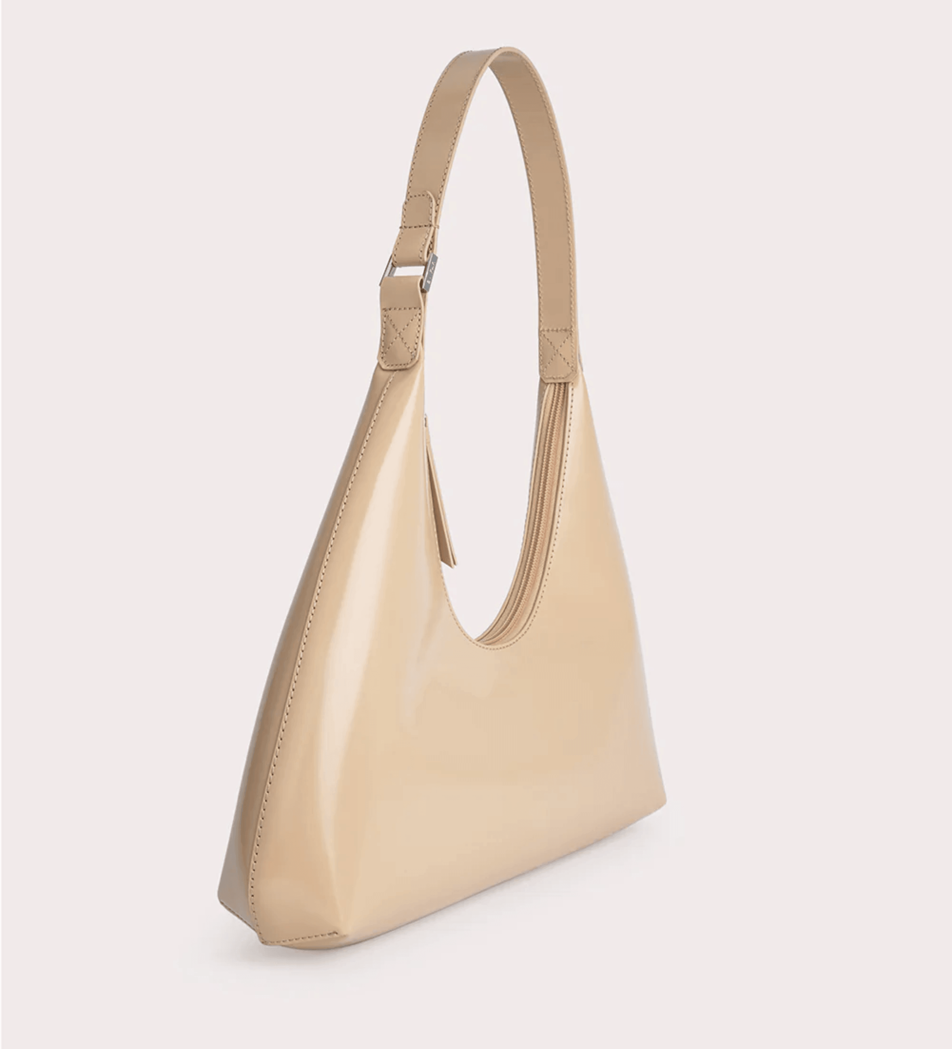 Baby Amber semi-patent mini leather hobo bag in beige with adjustable shoulder strap and buckle detail — By Far | Endless UAE