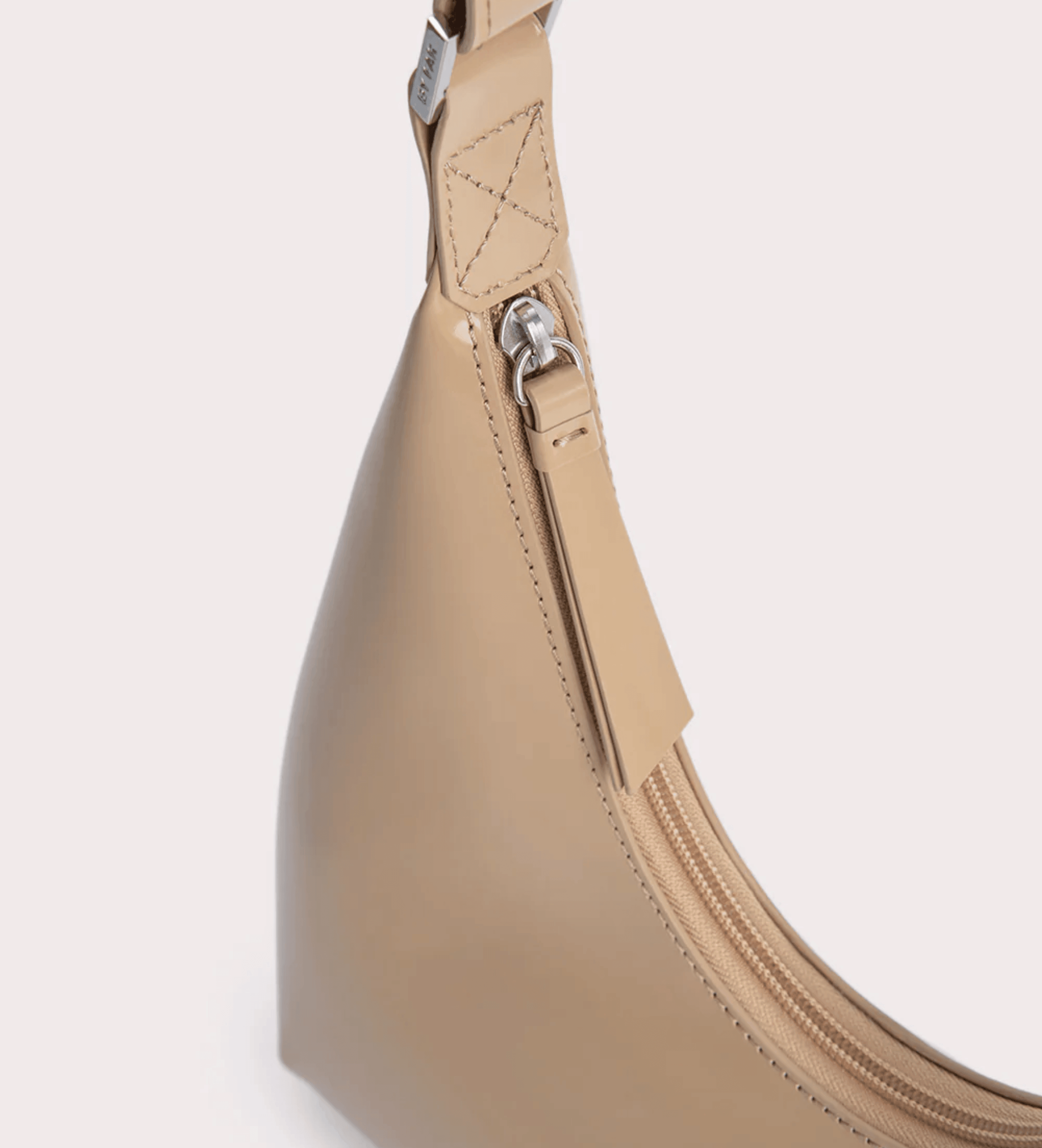Baby Amber semi patent mini leather handbag in beige with silver hardware and adjustable strap — By Far | Endless UAE