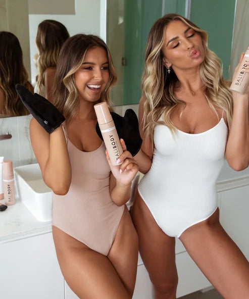 Self-tanning mousse in dark shade bottle with pump dispenser — Powder Beauty | Endless UAE
