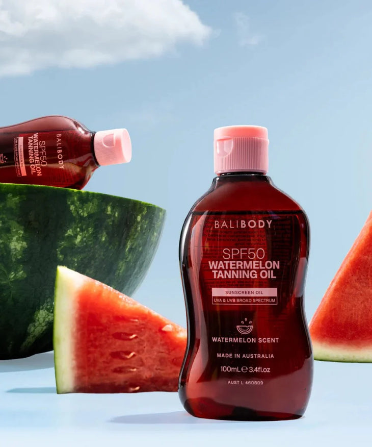 Bali Body SPF50 Watermelon Tanning Oil in amber bottle with pink cap — Powder Beauty | Endless UAE