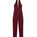 Plum halter neck tailored jumpsuit with deep V-neckline and fitted silhouette on white background — Gucci | Endless UAE