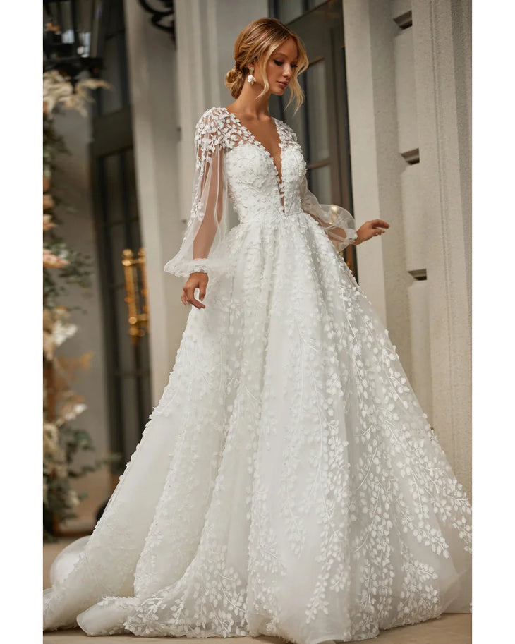 Marcy white lace wedding dress with sheer floral sleeves and plunging neckline — Katy Corso | Endless UAE
