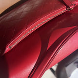 Red leather curved messenger bag with interlocking CC logo detail — Chanel | Endless UAE